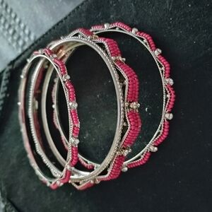 Elegant Silver and Red Bracelets with Continuous Design